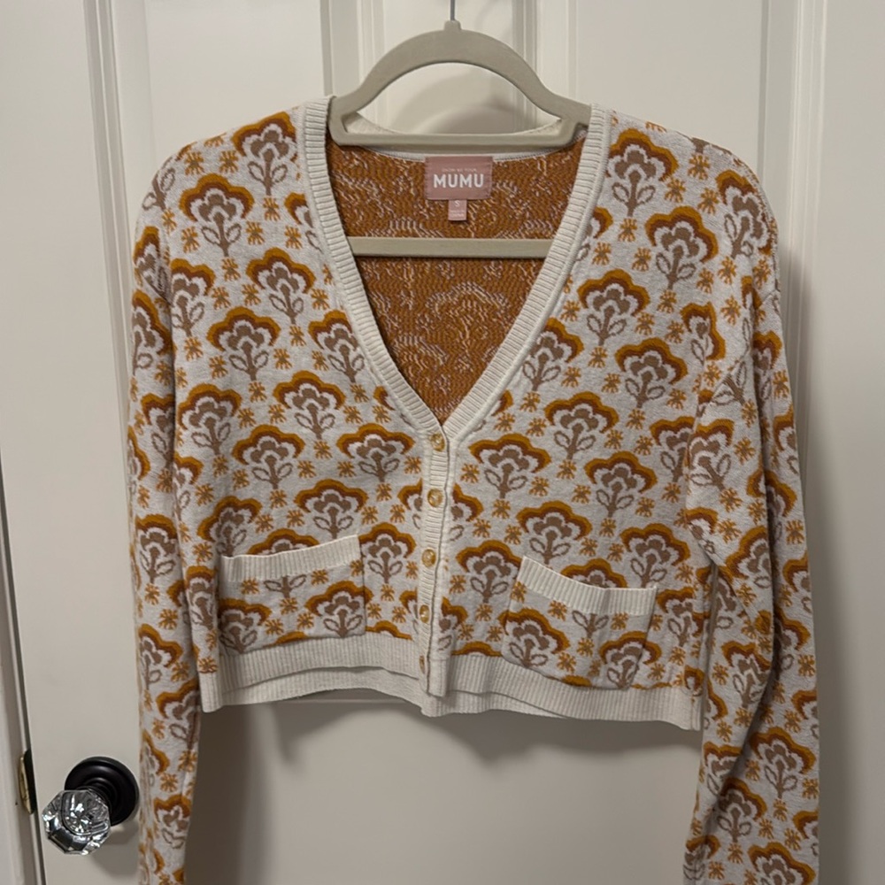 Show me your mumu sweater.  Excellent condition. Zero stains or marks.